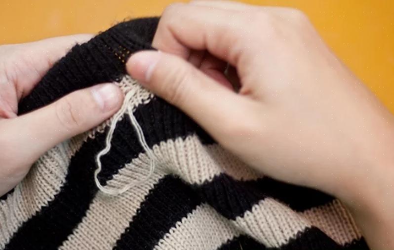 Først skal du aldrig afskære den fastklemte tråd eller bruge en sweater-barbermaskine eller barbermaskine